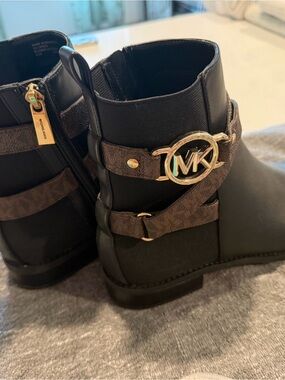 Michael Kors Rory Black Flat Boots with Brown Logo Straps and Gold MK Hardware
